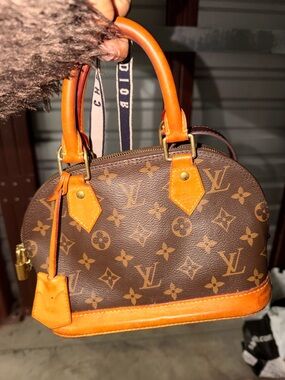 Louis Vuitton Monogram Mini Alma in Brown with Tan Trim